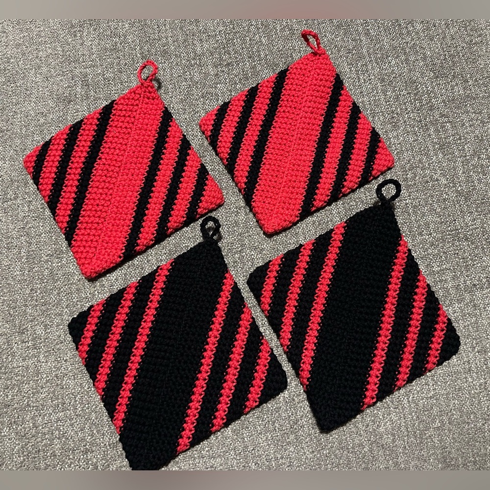 Pot Holders or Hot Pads.  Hand Crocheted 
2 Sets Of 2.